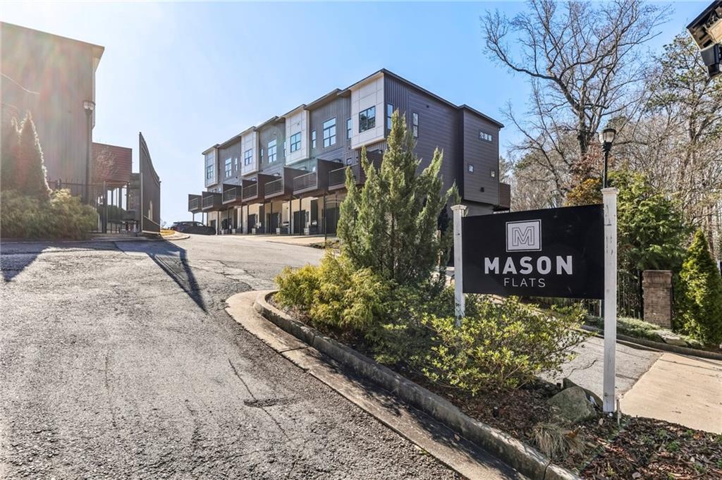 2336 Mason Drive Atlanta, GA 30316 - Photo 19 of 19 a front view of a building with garden