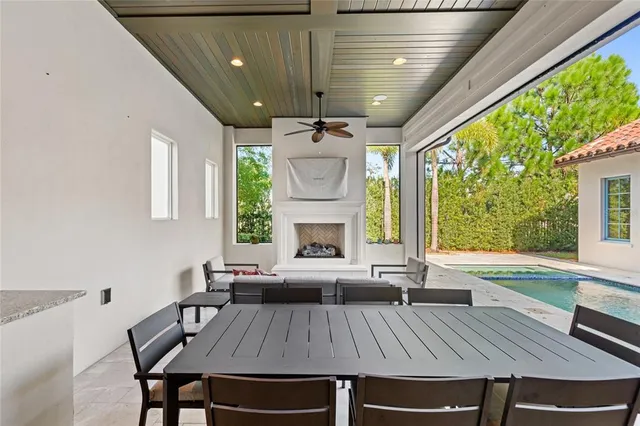 a view of a dining room with furniture window and outside view