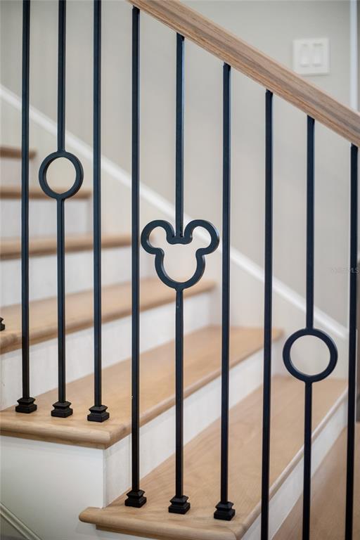 10224 Mattraw Place Orlando, FL 32836 - Photo 37 of 44 a view of hall with a floor to ceiling window and wooden floor