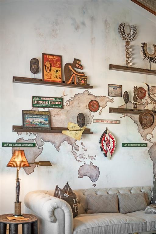 10224 Mattraw Place Orlando, FL 32836 - Photo 40 of 44 a living room with a couch and chandelier