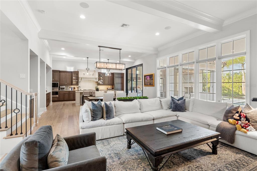 10224 Mattraw Place Orlando, FL 32836 - Photo 4 of 44 a living room with furniture and a large window