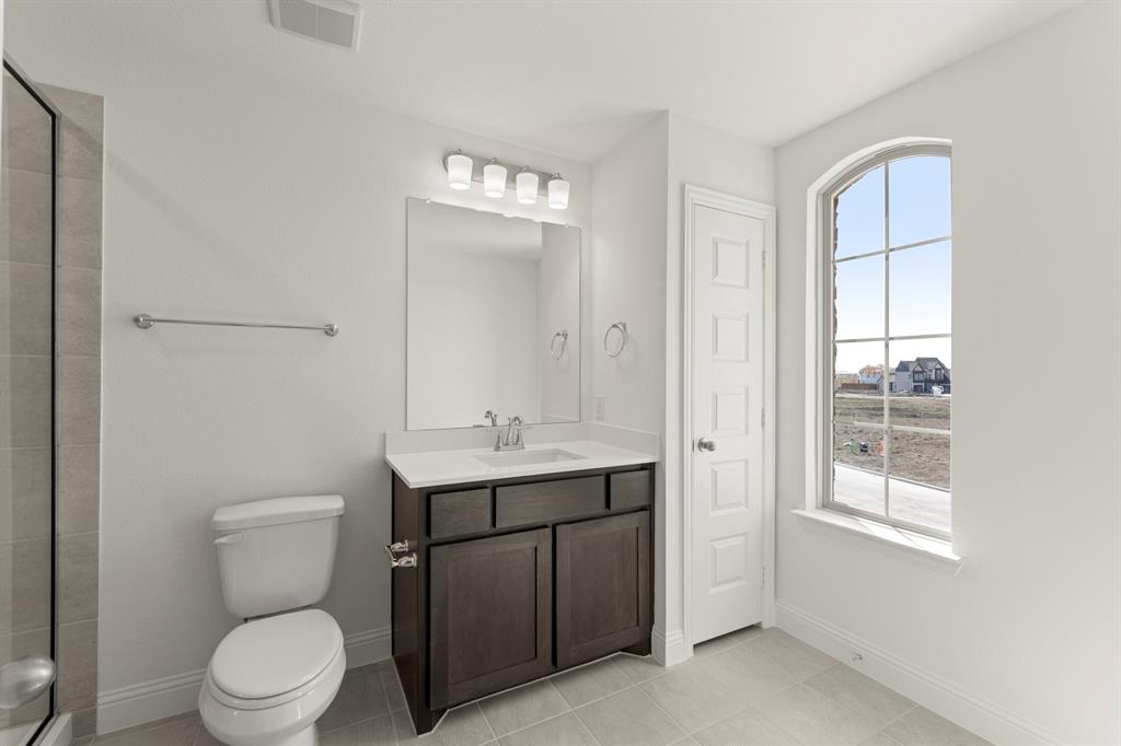 512 Pinnacles Court Forney, TX 75126 - Photo 22 of 28 21_22. 512 Pinnacles - 2ND Bath