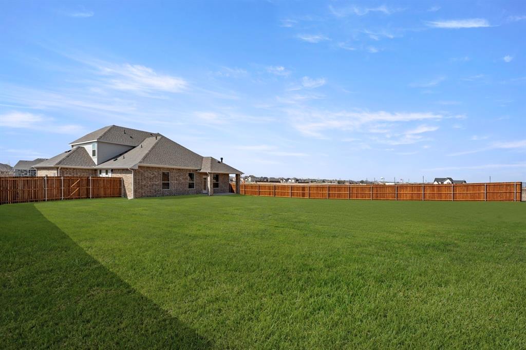 512 Pinnacles Court Forney, TX 75126 - Photo 27 of 28 26_27. 512 Pinnacles - Back (2) Large