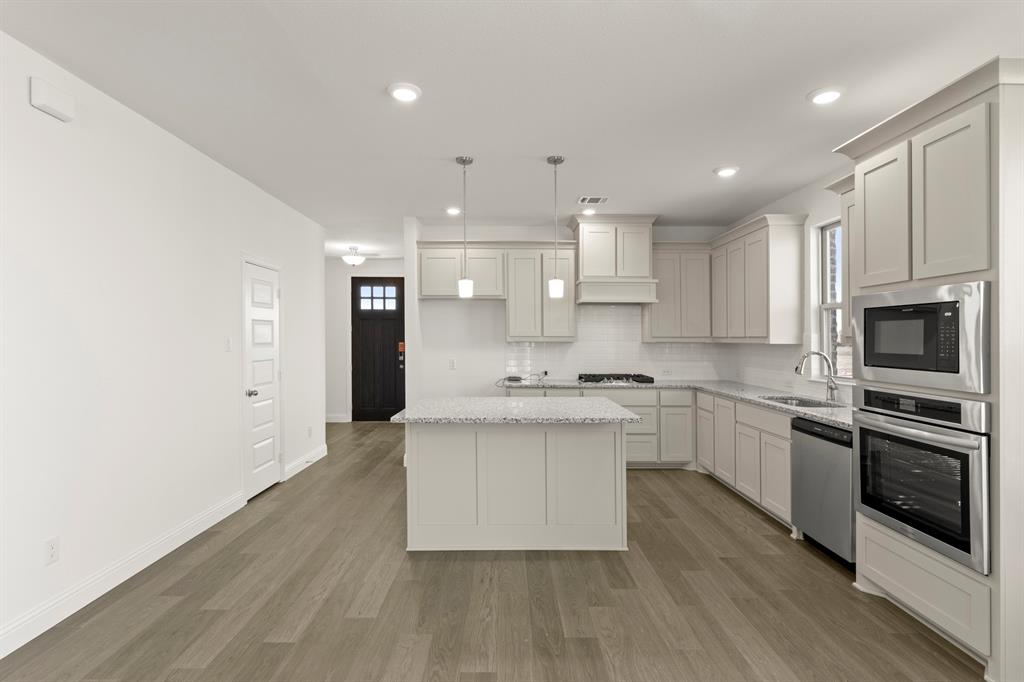 512 Pinnacles Court Forney, TX 75126 - Photo 5 of 28 4_05. 512 Pinnacles - Kitchen