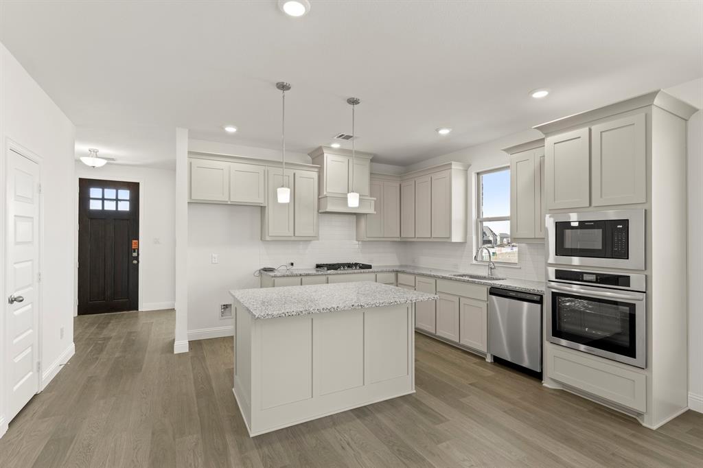 512 Pinnacles Court Forney, TX 75126 - Photo 6 of 28 5_06. 512 Pinnacles - Kitchen (2)