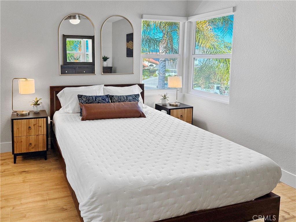 16955 Lake Knoll Parkway Riverside, CA 92503 - Photo 24 of 42 a bedroom with a bed and window