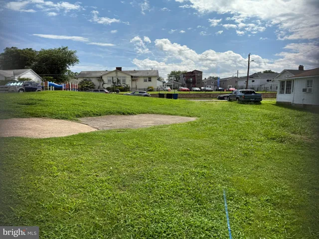 a view of building with yard