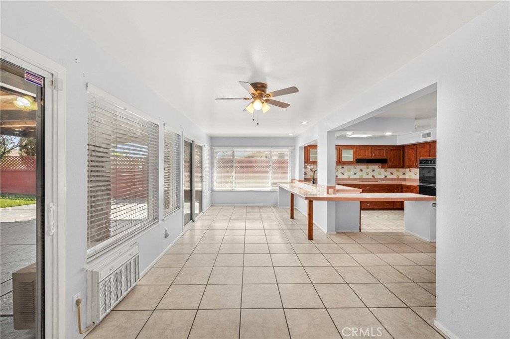 25915 Roanoke Road Menifee, CA 92586 - Photo 16 of 58 a view of an entryway with a chandelier