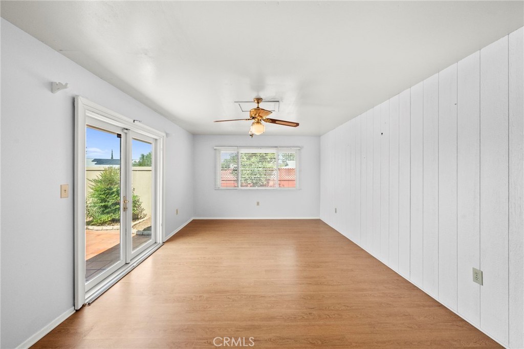 25915 Roanoke Road Menifee, CA 92586 - Photo 2 of 58 an empty room with windows