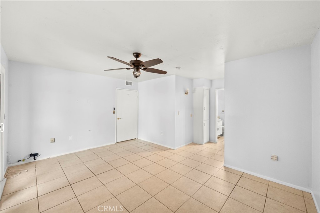 25915 Roanoke Road Menifee, CA 92586 - Photo 28 of 58 a view of a room with a fan and a window