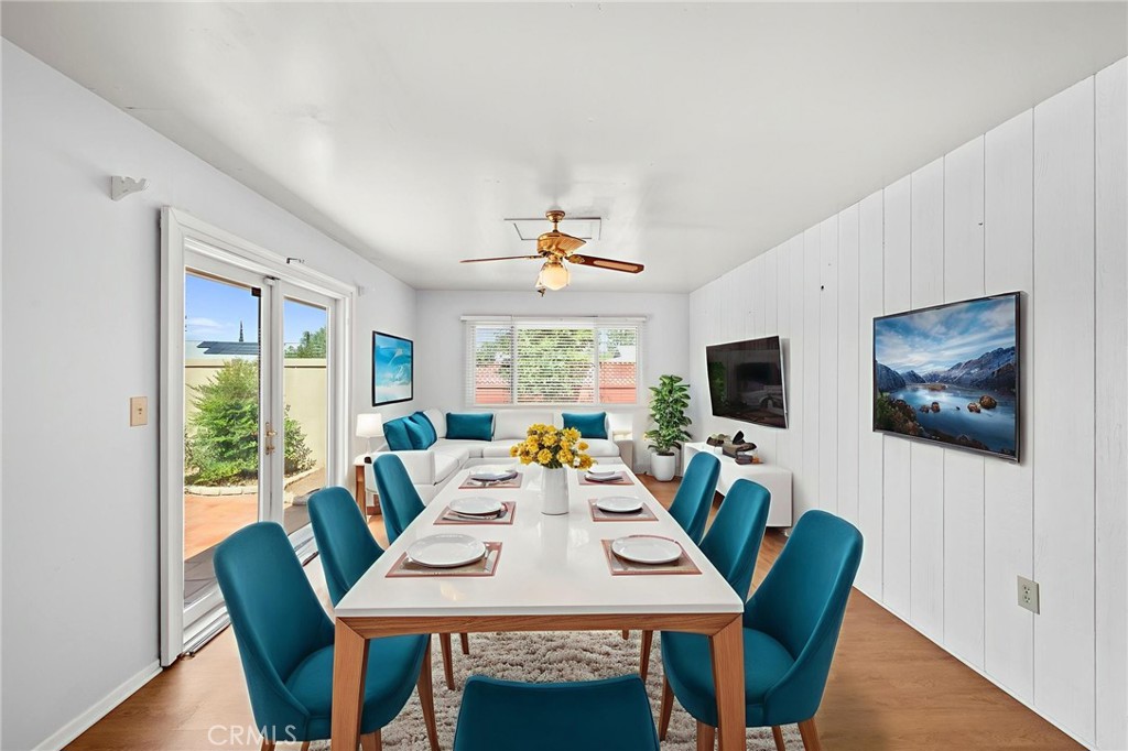 25915 Roanoke Road Menifee, CA 92586 - Photo 3 of 58 a view of a dining room with furniture window and wooden floor