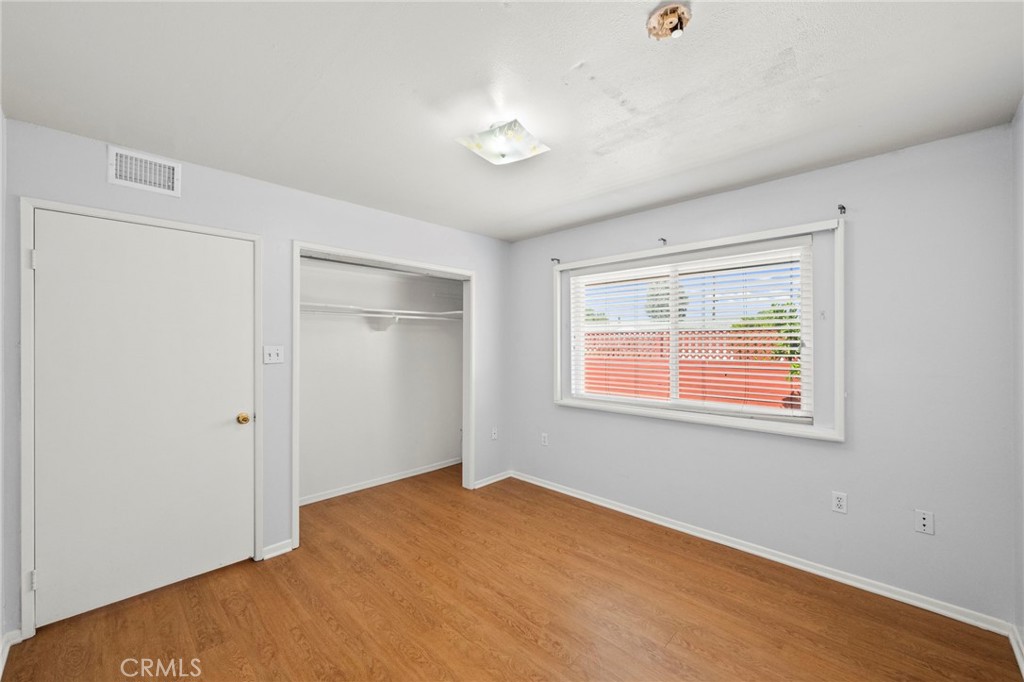 25915 Roanoke Road Menifee, CA 92586 - Photo 35 of 58 a view of an empty room with a window