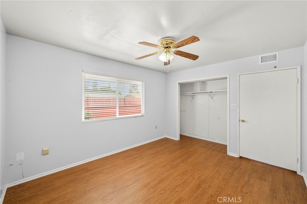 25915 Roanoke Road Menifee, CA 92586 - Photo 37 of 58 a view of a big room with carpet and windows