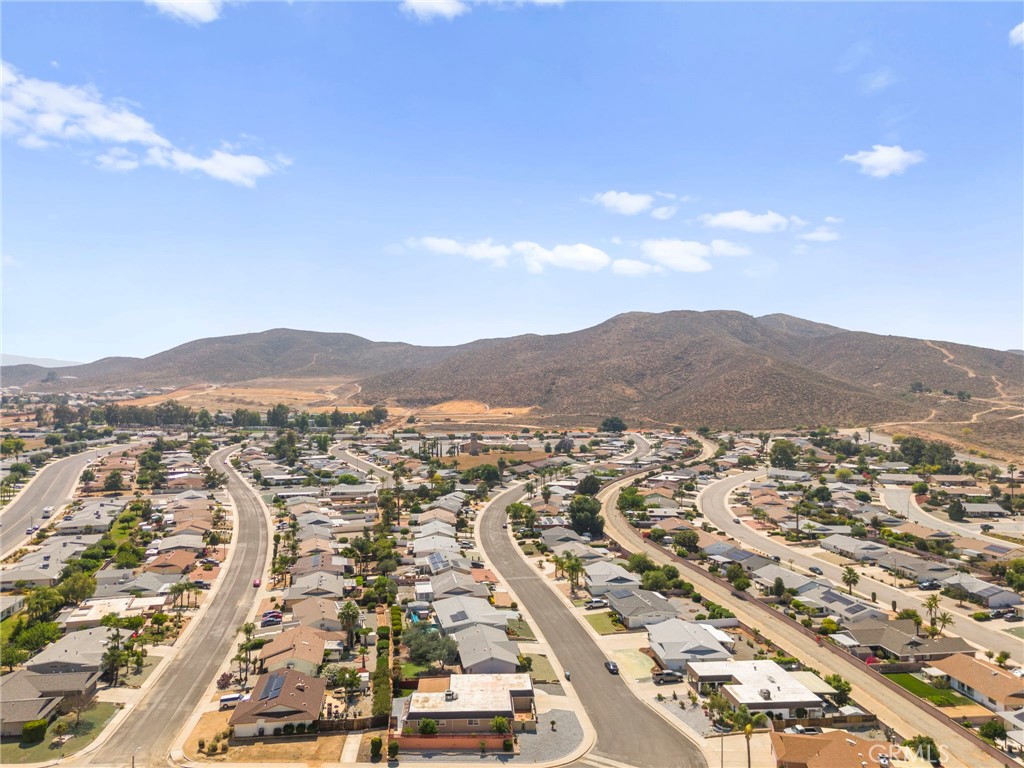 25915 Roanoke Road Menifee, CA 92586 - Photo 55 of 58 an aerial view of residential houses and city street