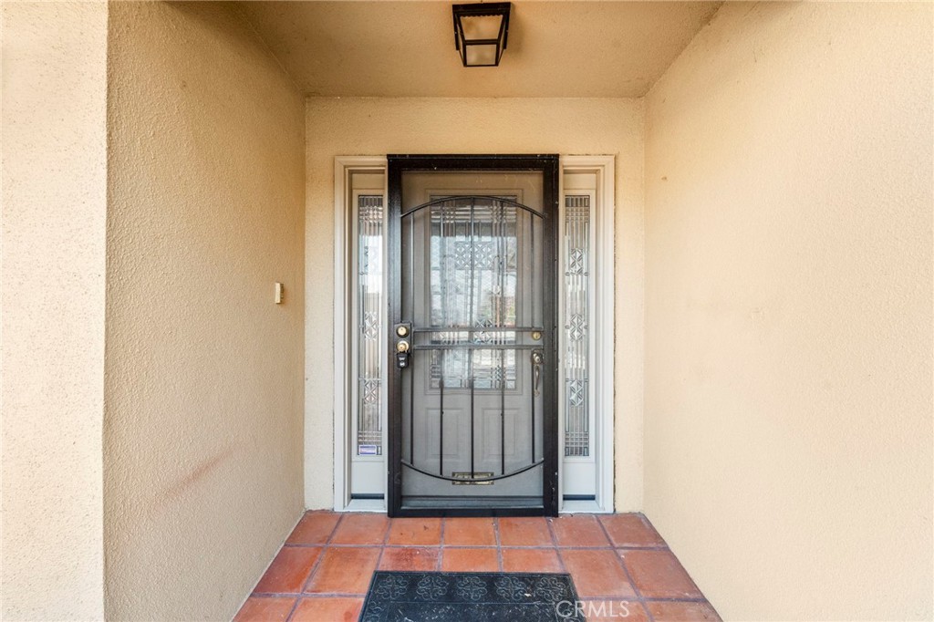 25915 Roanoke Road Menifee, CA 92586 - Photo 58 of 58 a view of a room that has a door in it
