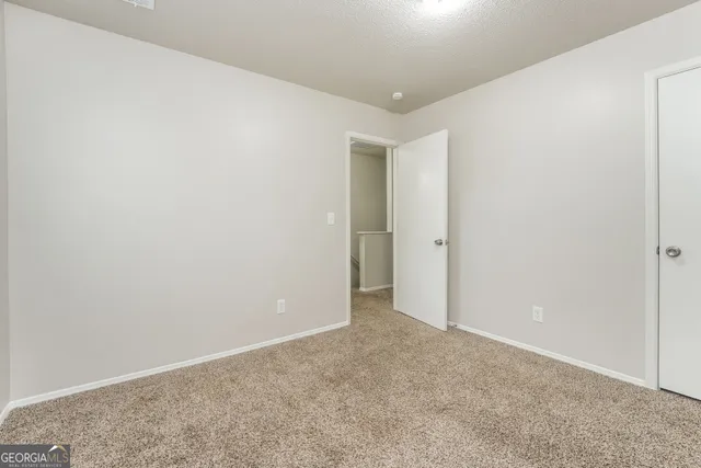 an empty room with an entryway