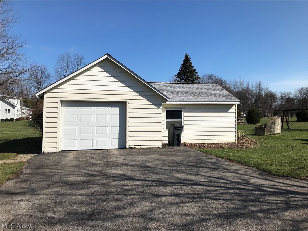 3313 Call Perry, OH 44081 - Photo 23 of 33 Single car garage has a workshop with 220v in it