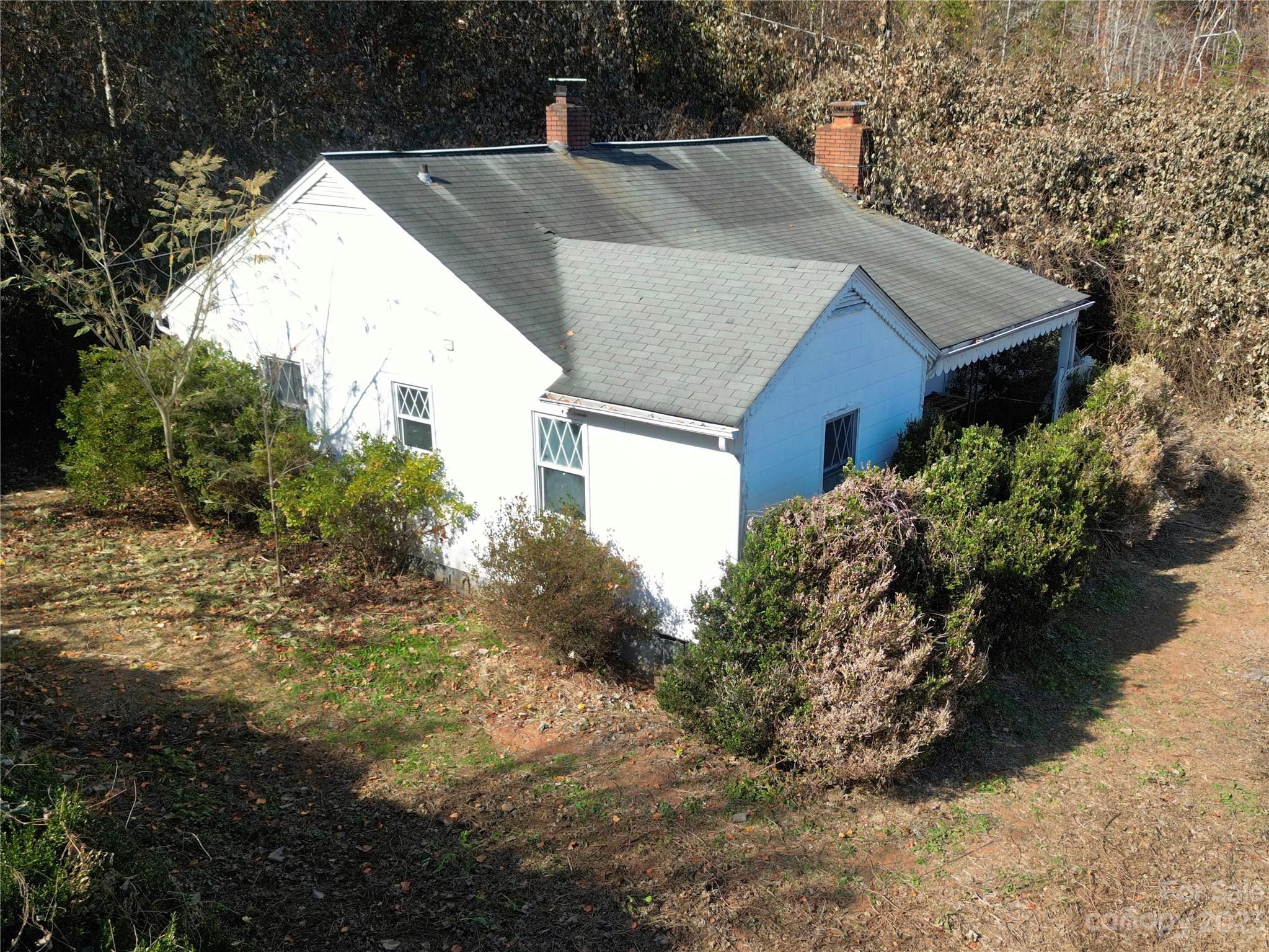 793 Silver Creek Road Mill Spring, NC 28756 - Photo 1 of 20 a house view with a outdoor space