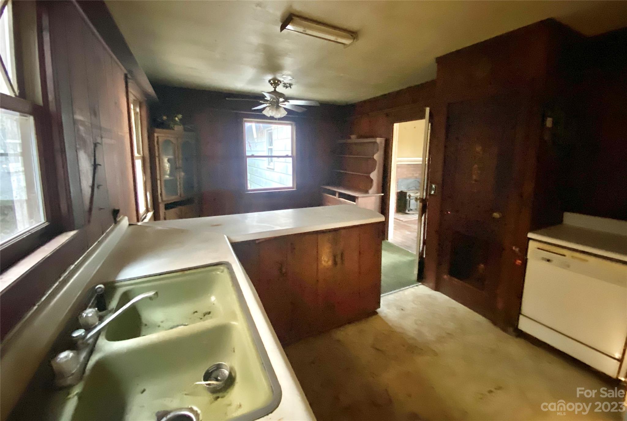 793 Silver Creek Road Mill Spring, NC 28756 - Photo 11 of 20 a bathroom with a sink and mirror