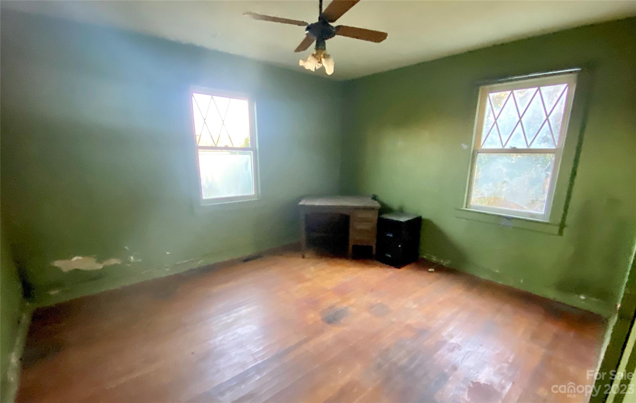793 Silver Creek Road Mill Spring, NC 28756 - Photo 16 of 20 a view of an empty room with a window