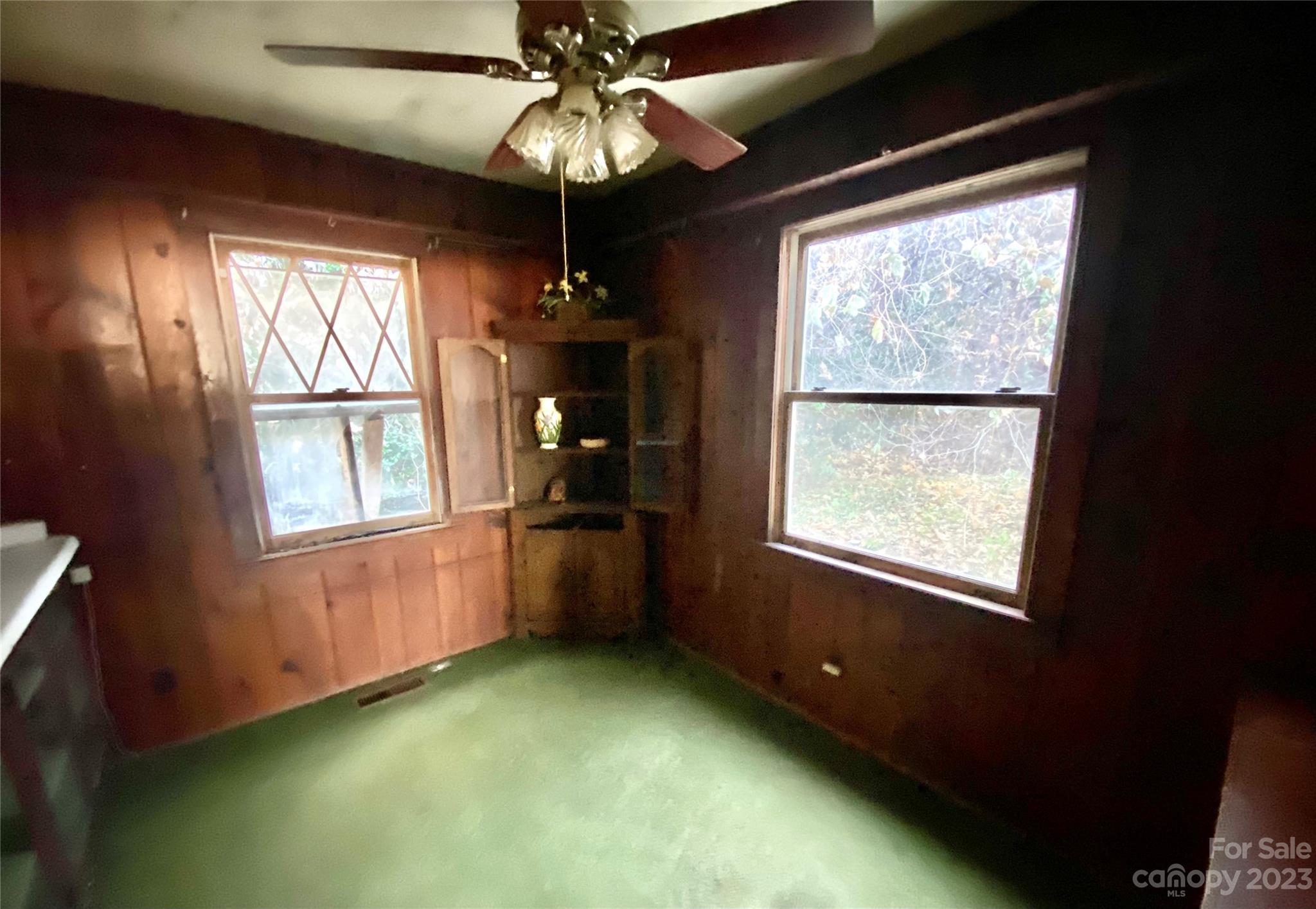 793 Silver Creek Road Mill Spring, NC 28756 - Photo 7 of 20 a view of an empty room with a window