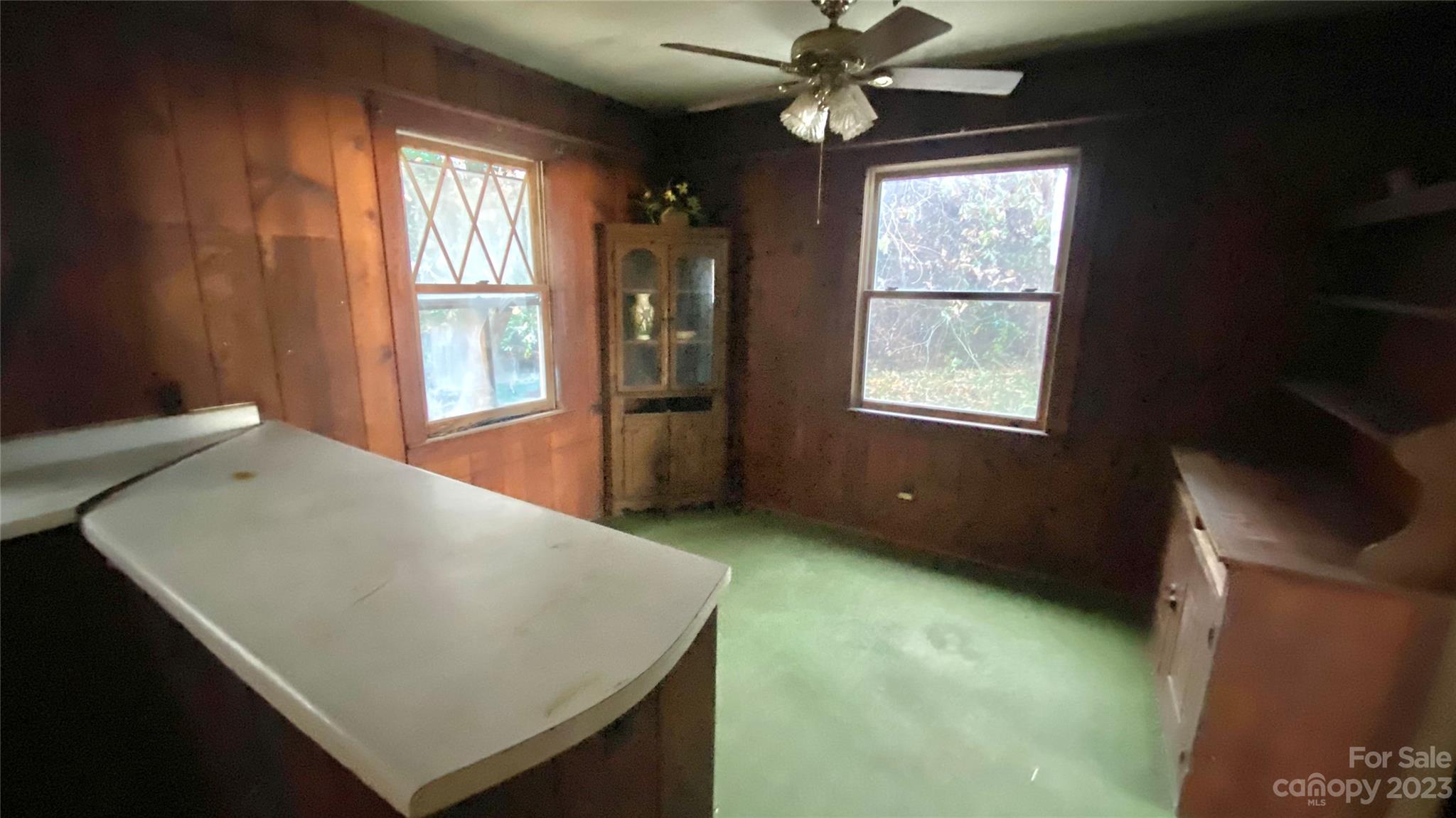 793 Silver Creek Road Mill Spring, NC 28756 - Photo 8 of 20 a view of an empty room with a window