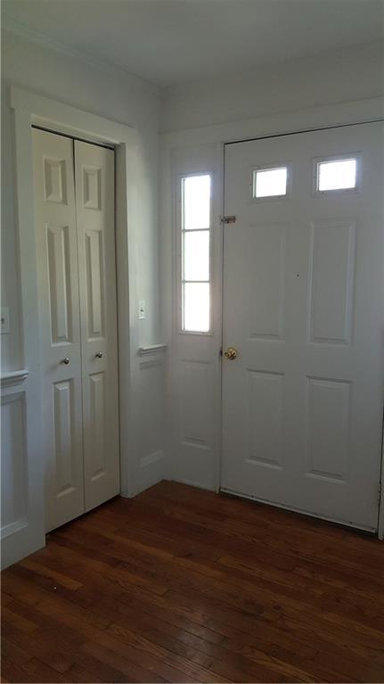 1933 Bristol Road Bristol, ME 04539 - Photo 6 of 31 Foyer hardwood flooring and chair...