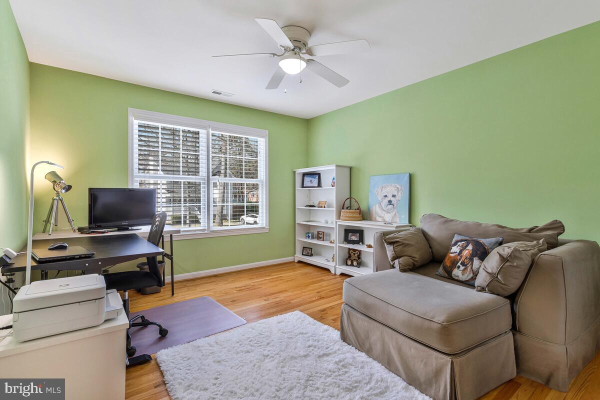 1713 Shore Drive Edgewater, MD 21037 - Photo 27 of 44 a living room with furniture and a flat screen tv