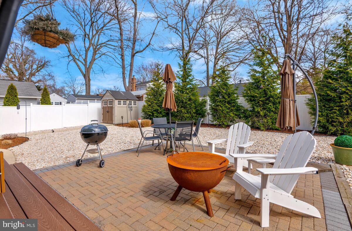 1713 Shore Drive Edgewater, MD 21037 - Photo 37 of 44 a view of a backyard with sitting area