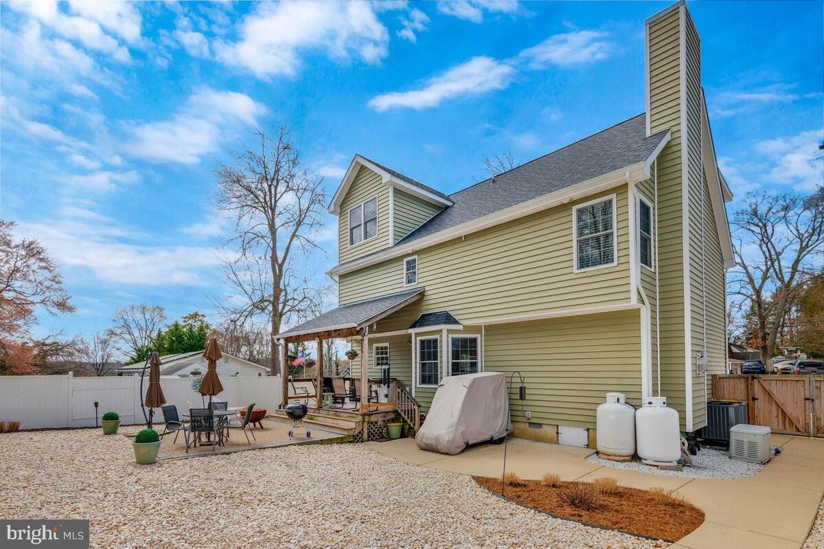 1713 Shore Drive Edgewater, MD 21037 - Photo 39 of 44 a backyard of a house with seating space