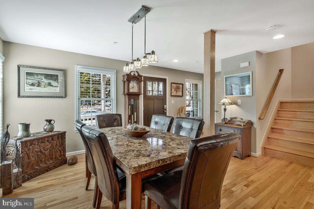1713 Shore Drive Edgewater, MD 21037 - Photo 6 of 44 a view of a dining room with furniture window and wooden floor