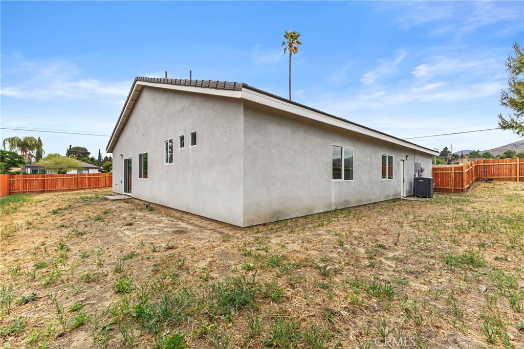 230 East Hoffer Street Banning, CA 92220 - Photo 23 of 32 a house view with a backyard space