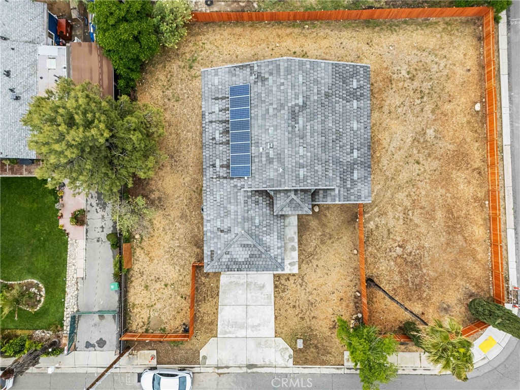 230 East Hoffer Street Banning, CA 92220 - Photo 25 of 32 front view of a brick house with a yard