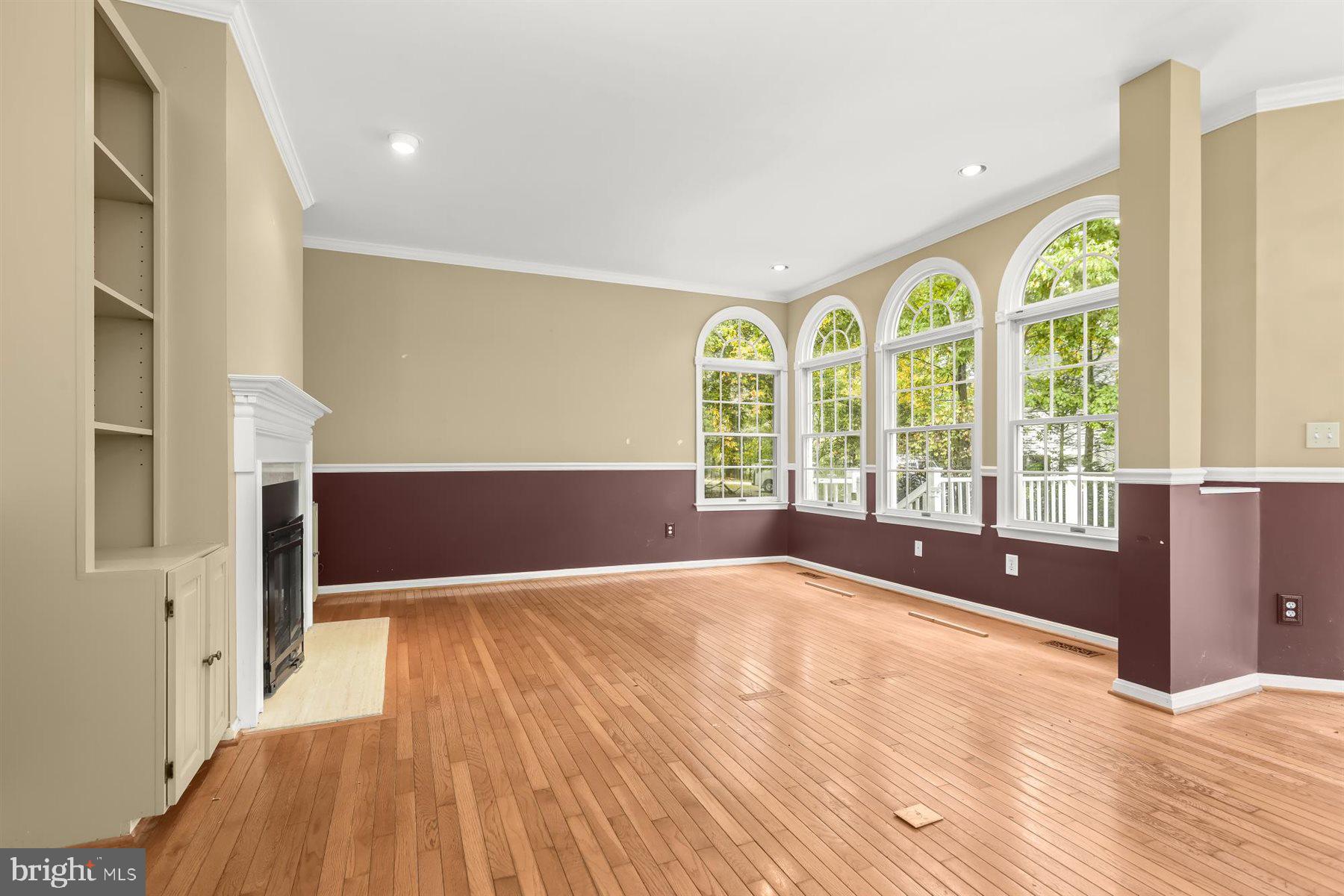 3360 Lawndale Road Reisterstown, MD 21136 - Photo 21 of 63 a view of an empty room with a window and wooden floor