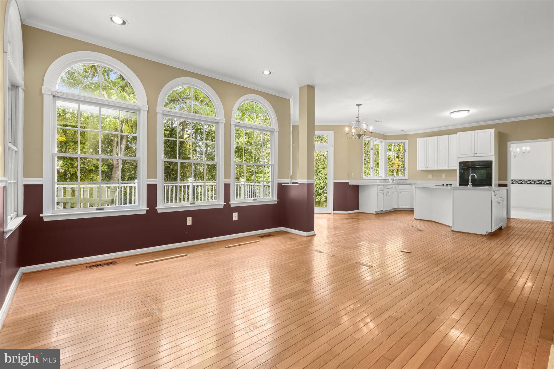 3360 Lawndale Road Reisterstown, MD 21136 - Photo 23 of 63 a view of an empty room with a window and wooden floor