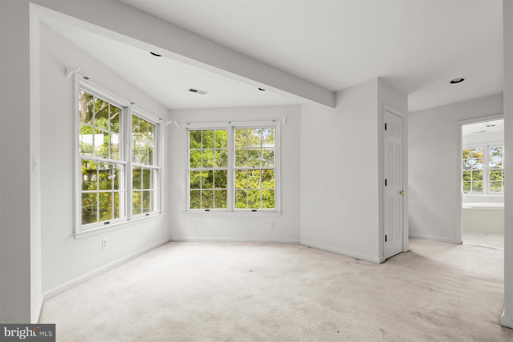 3360 Lawndale Road Reisterstown, MD 21136 - Photo 35 of 63 an empty room with windows and view of bathroom