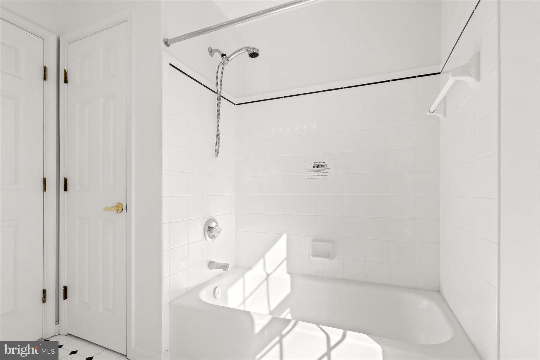 3360 Lawndale Road Reisterstown, MD 21136 - Photo 46 of 63 a bathroom with a bathtub and a shower