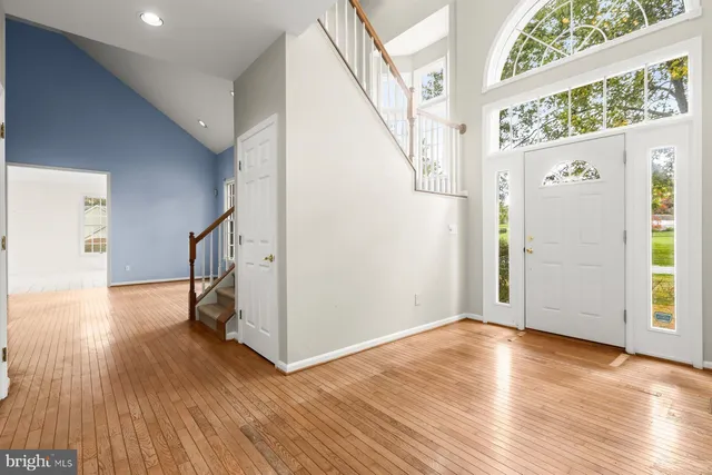 a view of entryway with wooden floor