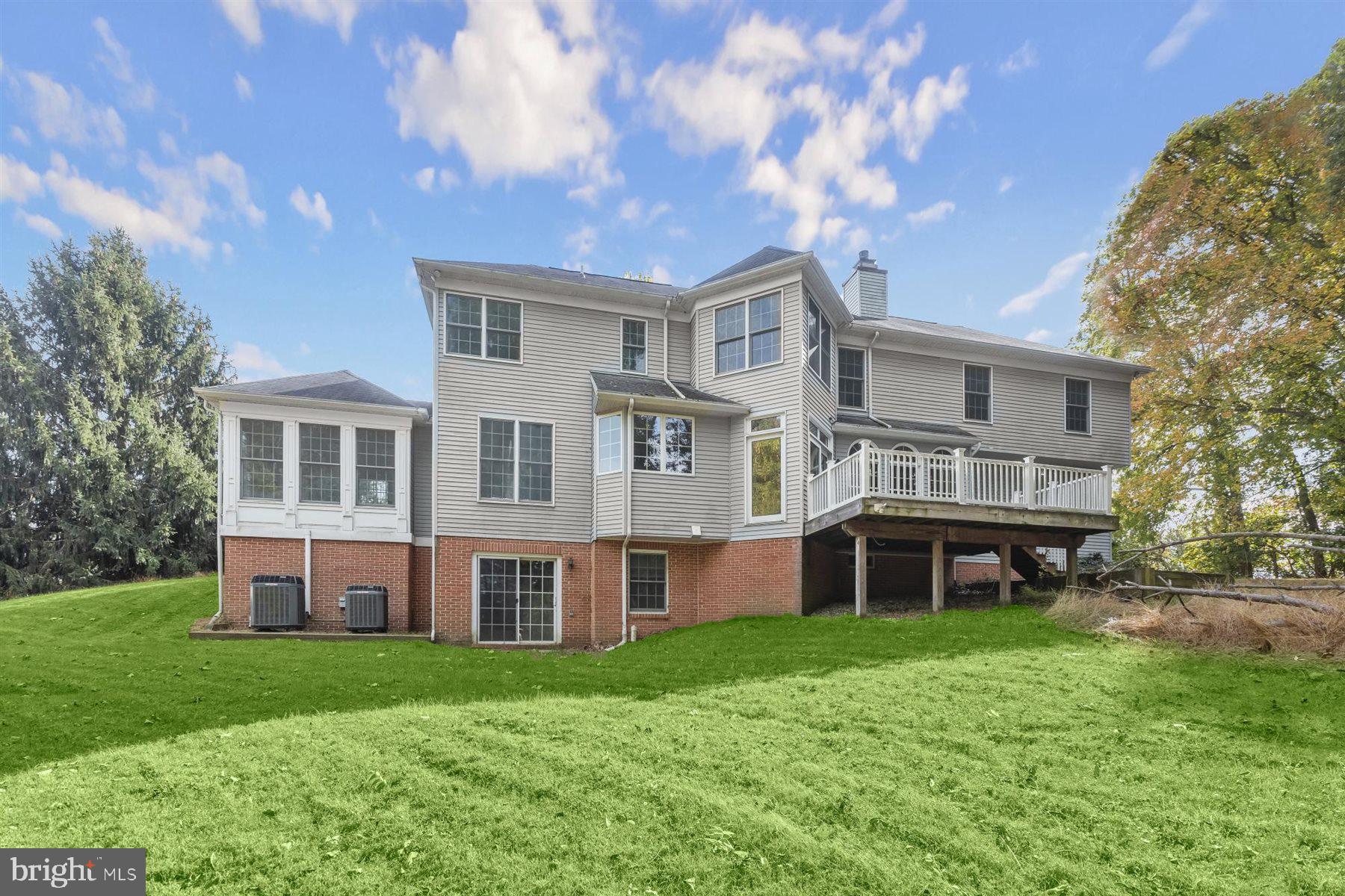 3360 Lawndale Road Reisterstown, MD 21136 - Photo 59 of 63 a front view of a house with a yard