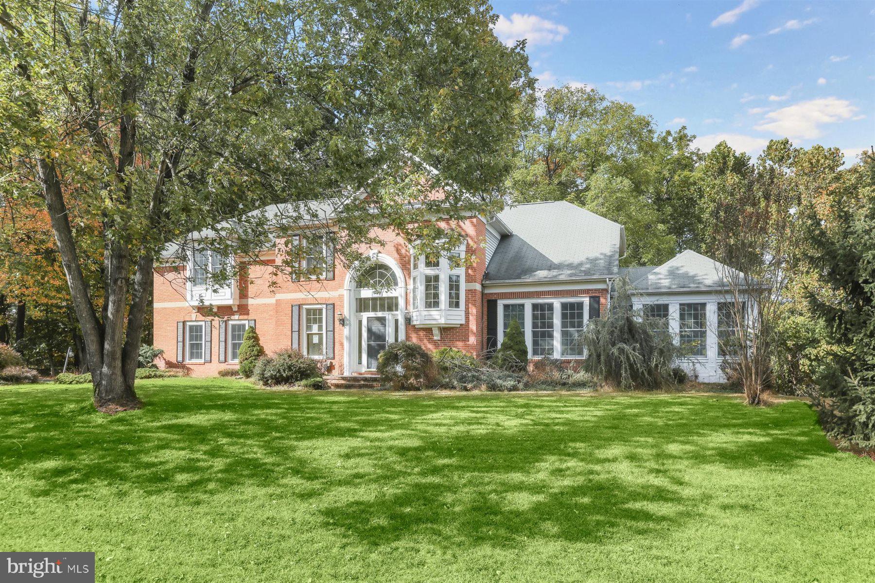 3360 Lawndale Road Reisterstown, MD 21136 - Photo 61 of 63 a front view of a house with a garden