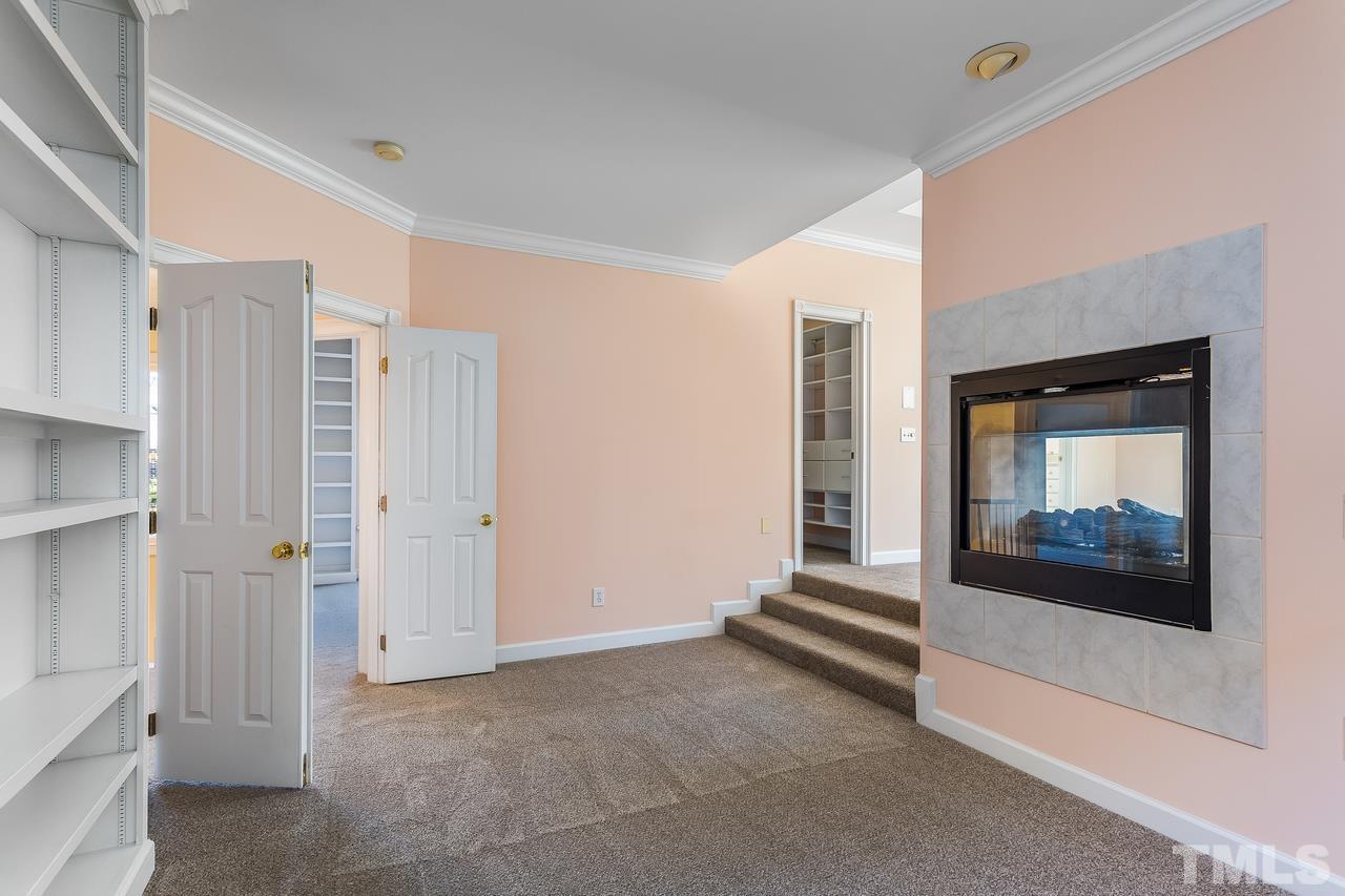 3117 Bentley Hill Road Raleigh, NC 27612 - Photo 21 of 27 Fresh carpet and gas log fireplace