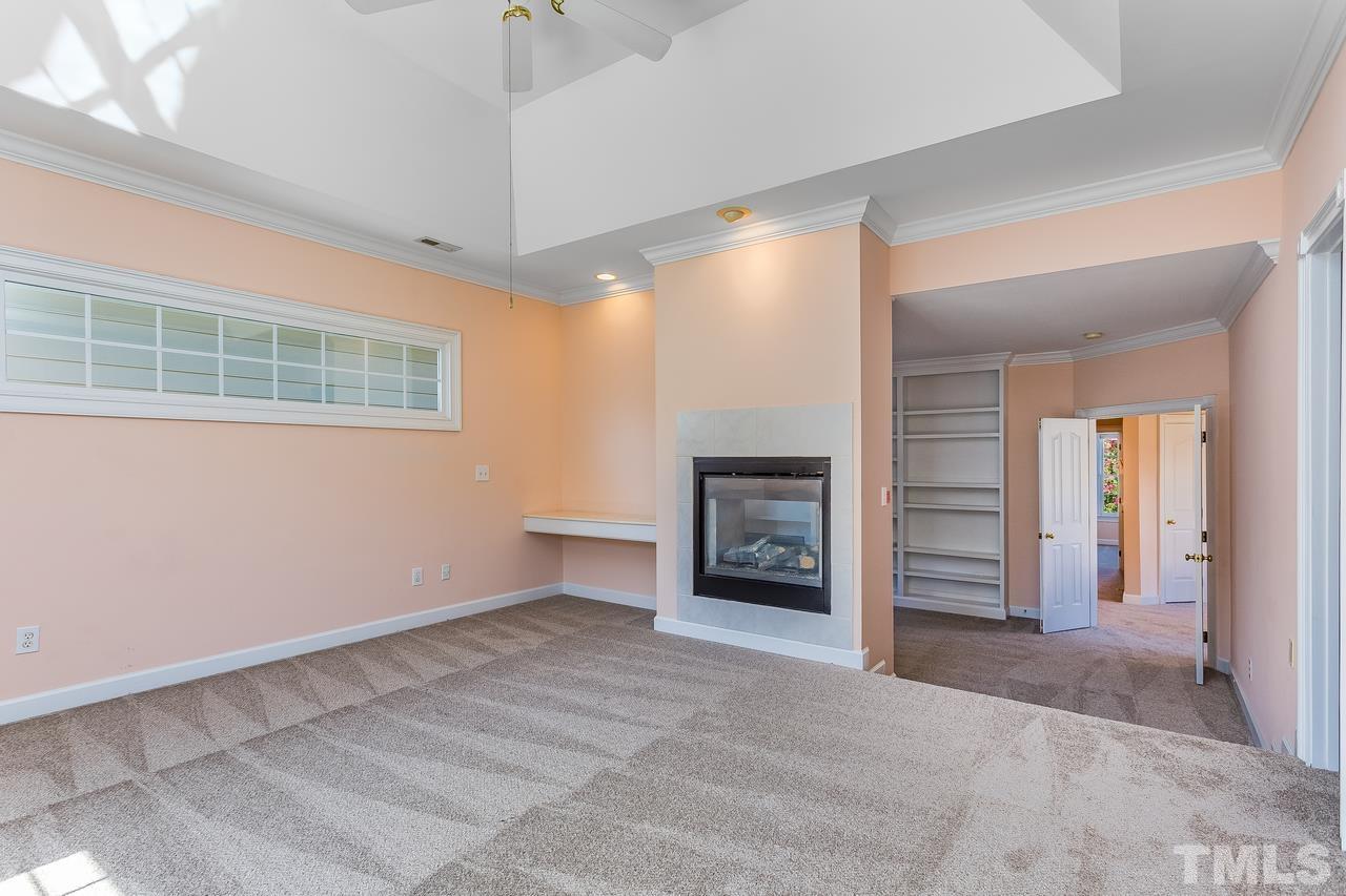 3117 Bentley Hill Road Raleigh, NC 27612 - Photo 24 of 27 More new carpet and custom shelving
