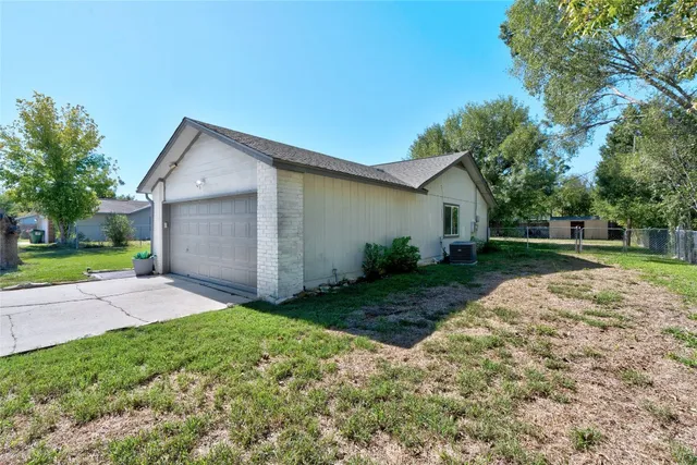 a view of a livingroom with furniture window and wooden floor
