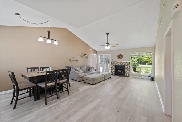 a living room with furniture and white walls