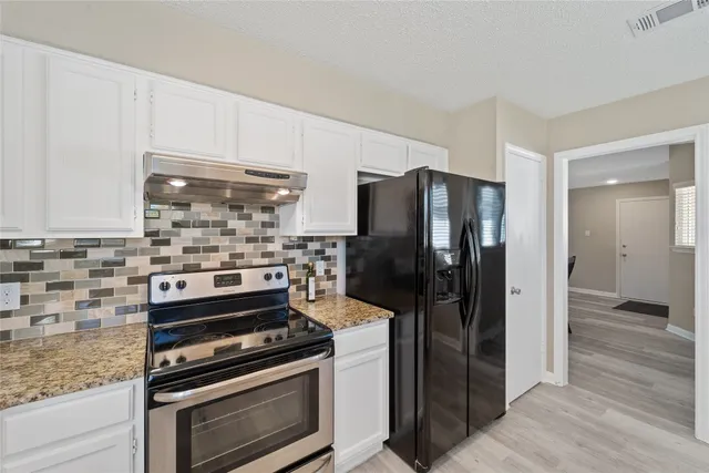 a bathroom with a sink and a bathtub