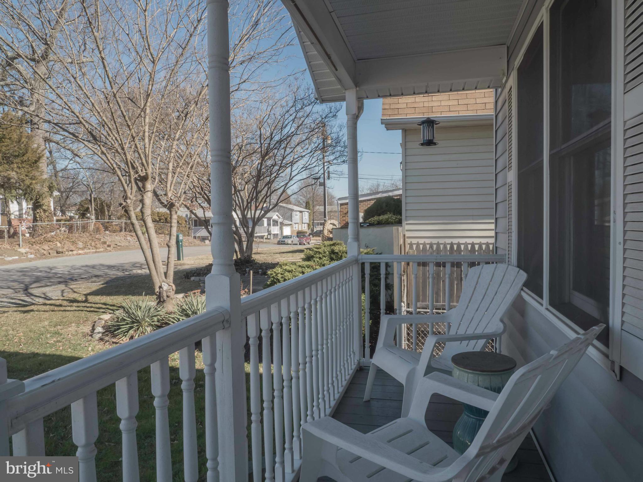 413 Salisbury Road Edgewater, MD 21037 - Photo 2 of 30 a view of balcony with wooden floor and fence