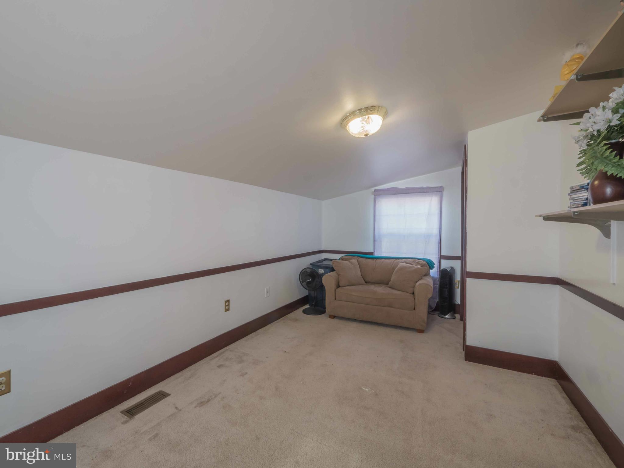 413 Salisbury Road Edgewater, MD 21037 - Photo 21 of 30 a living room with furniture and a couch