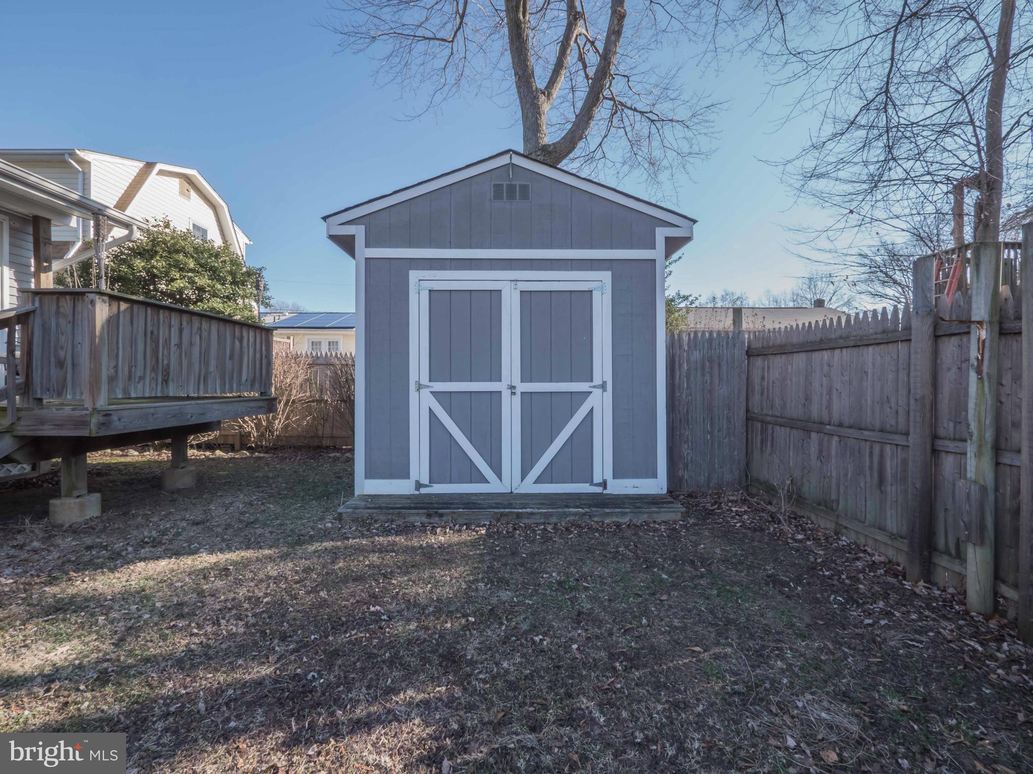 413 Salisbury Road Edgewater, MD 21037 - Photo 28 of 30 a view of backyard with barn and a large window