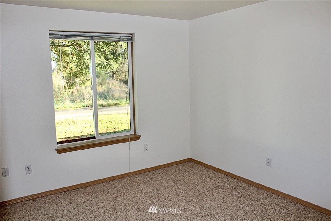 9836 179th Way Southwest Rochester, WA 98579 - Photo 16 of 26 an empty room with a window