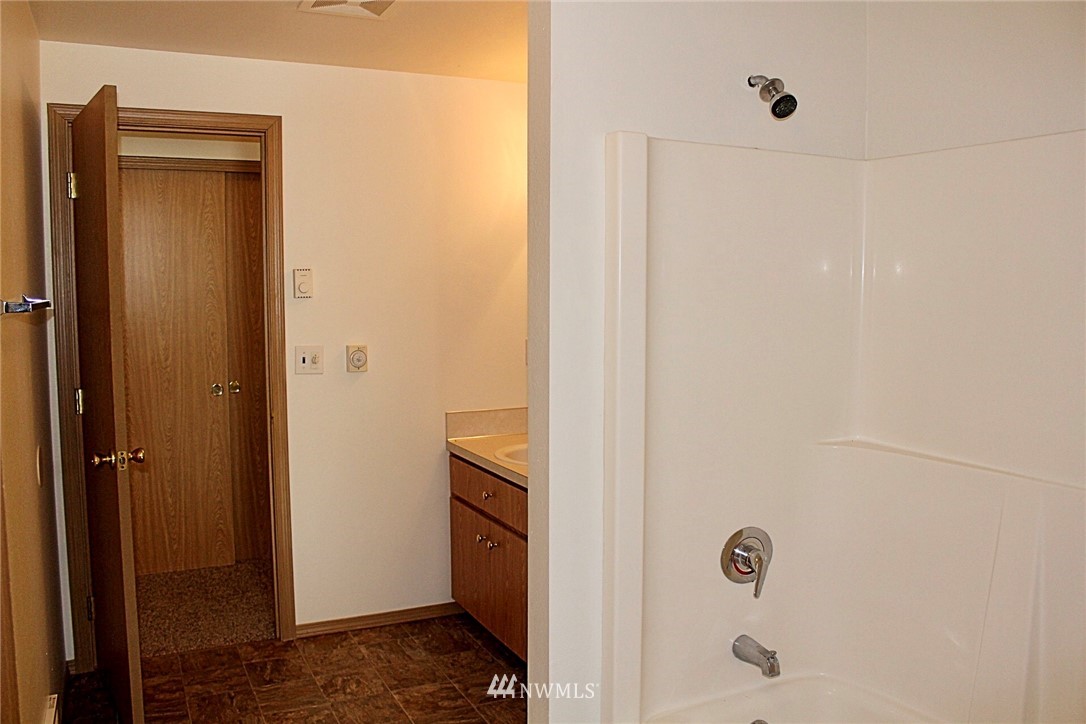 9836 179th Way Southwest Rochester, WA 98579 - Photo 18 of 26 a bathroom with a shower